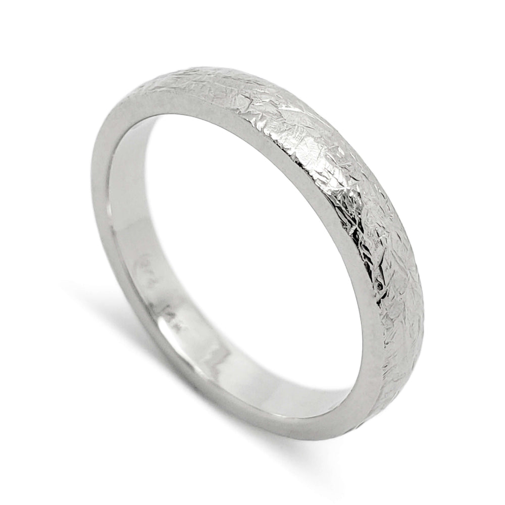 14kt white gold wedding band with elephant skin texture and domed profile