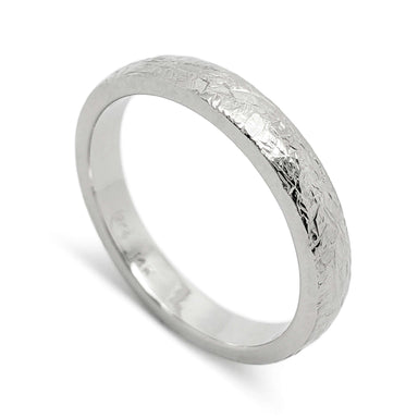 14kt white gold wedding band with elephant skin texture and domed profile