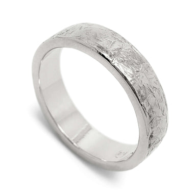 14kt white gold wedding band with elephant skin texture, angled view