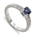 14kt white gold engagement ring with blue Montana sapphire and diamond accents, engraved band