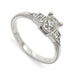 14kt white gold engagement ring with old mine cut antique diamond and baguette accents