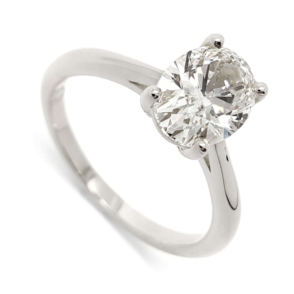 14kt white gold engagement ring with an oval lab-grown diamond in a four-prong setting
