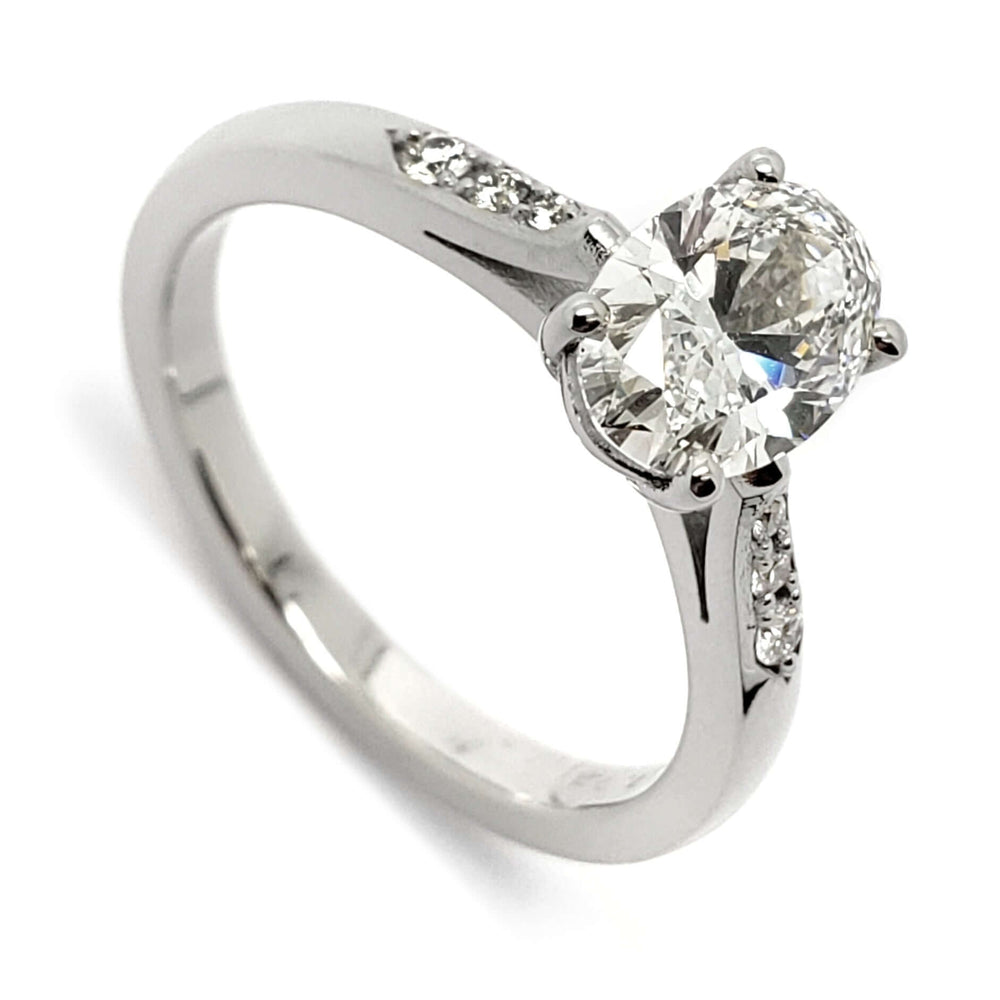 14kt white gold engagement ring with oval lab-grown diamond and pave-set band