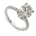 14kt white gold engagement ring with oval lab grown diamond and French pave band
