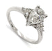 14kt white gold engagement ring with pear cut lab grown diamond and round accent diamonds