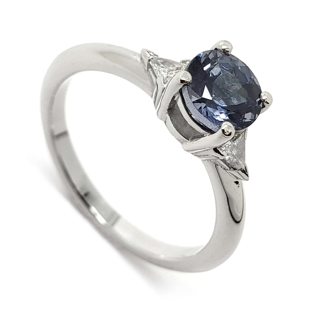 14kt white gold engagement ring with round blue-grey spinel and triangle diamonds