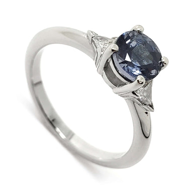 14kt white gold engagement ring with round blue-grey spinel and triangle diamonds