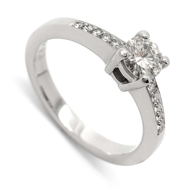 14kt white gold engagement ring with round moissanite and pave-set lab diamonds
