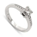 14kt white gold engagement ring with round moissanite and pave-set lab diamonds