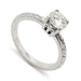 14kt white gold engagement ring with round moissanite and engraved wheat pattern