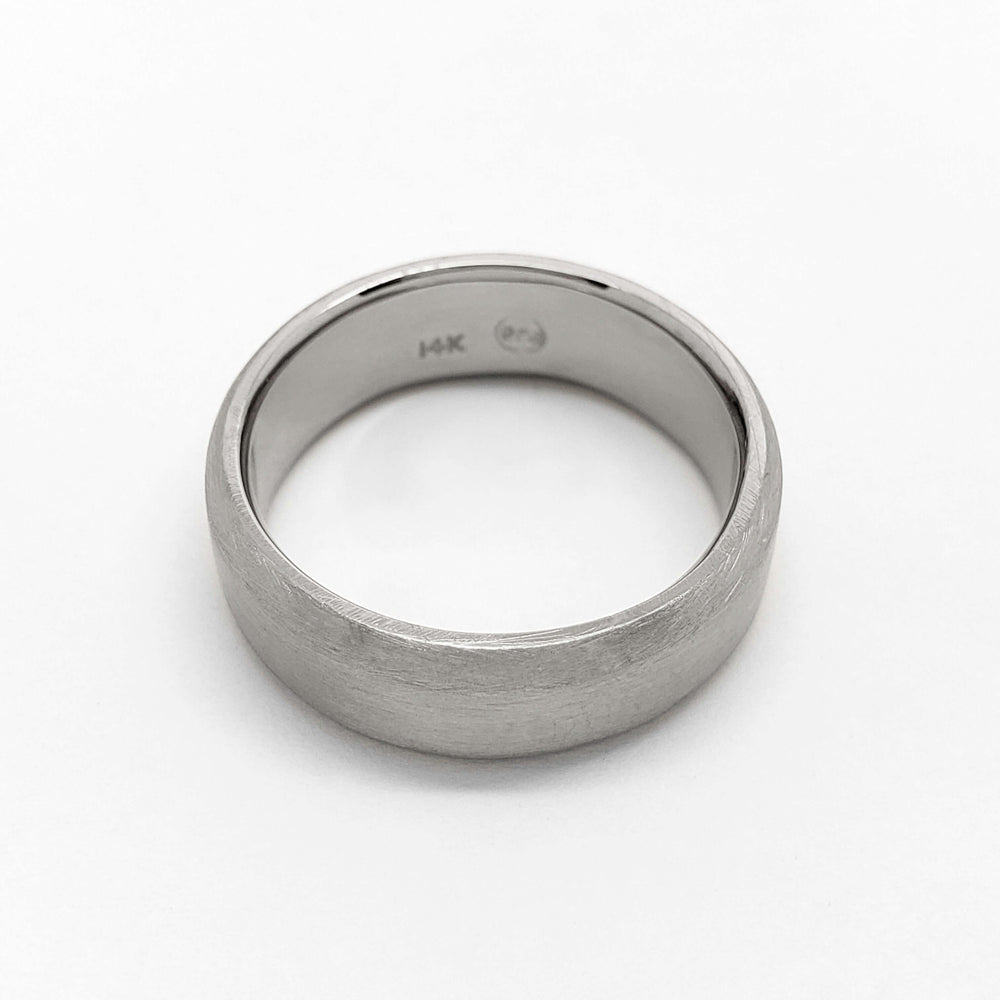 14kt white gold flat wedding band with brushed texture, top view