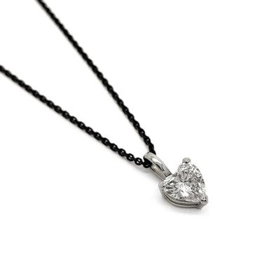 14kt white gold heart lab diamond pendant on a black chain, close-up view