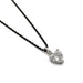 14kt white gold heart lab diamond pendant on a black chain, close-up view