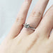 14kt white gold lab diamond engagement ring worn on a hand