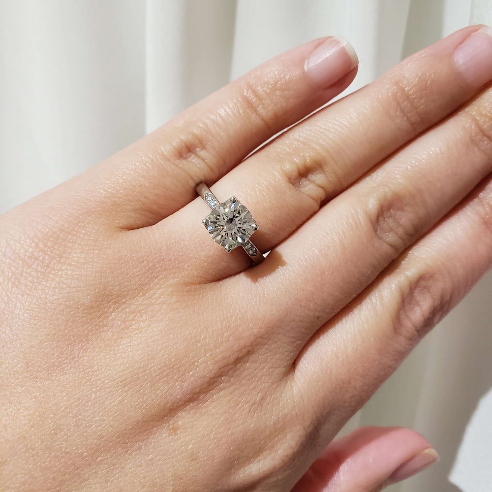 14kt white gold lab diamond engagement ring shown on hand