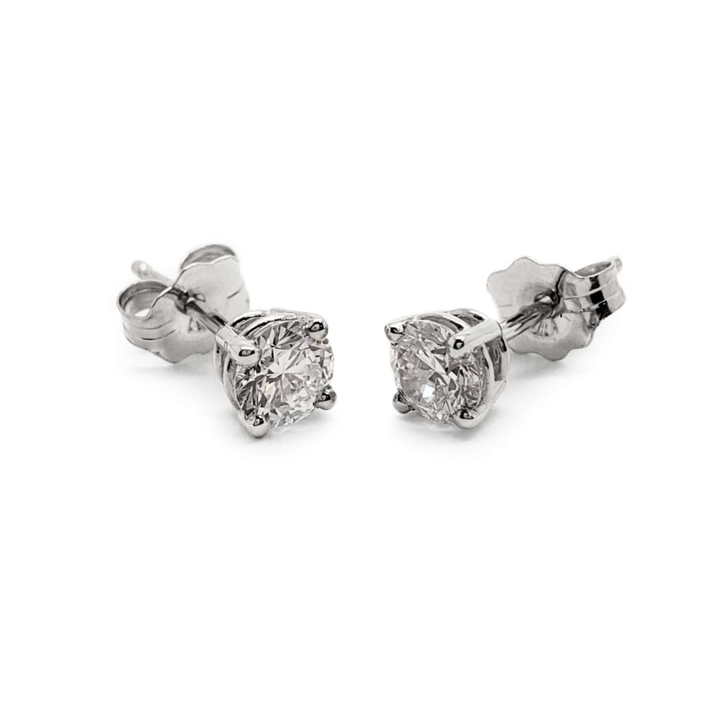 Pair of 14kt white gold lab diamond stud earrings with round lab diamonds