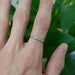 14kt white gold lab diamond wedding ring worn on hand