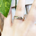14kt white gold millgrain wedding ring shown on hand