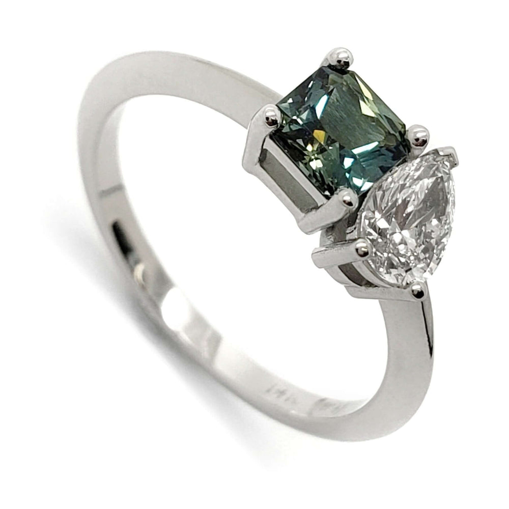 14kt white gold moi et toi ring with teal Australian sapphire and pear lab diamond, angled view