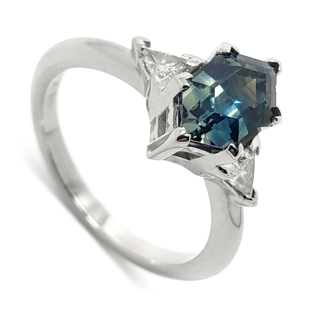 14kt white gold ring with hexagon blue Montana sapphire and triangle diamonds, angled view