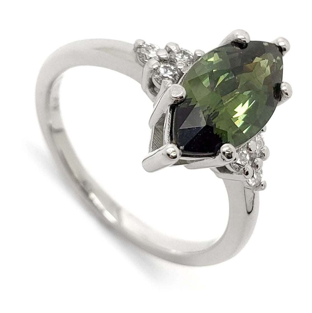 14kt white gold ring with marquise green sapphire and Canadian diamond accents