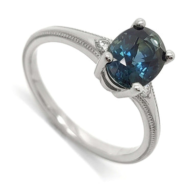 14kt white gold ring with oval blue-green Australian sapphire and Canadian diamond accents