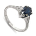 14kt white gold ring with oval blue Australian sapphire and Canadian diamond accents, millgrain detail