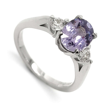 14kt white gold ring with oval lavender sapphire and two round lab-grown diamonds