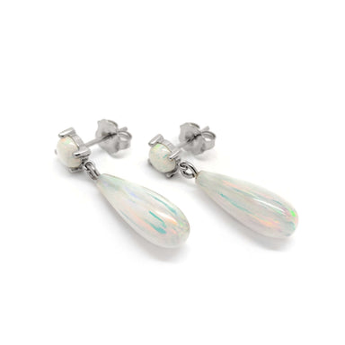 Pair of 14kt white gold drop earrings with round and teardrop simulated opals