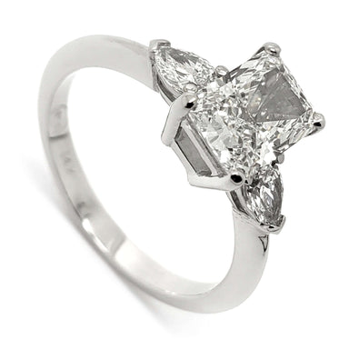 14kt white gold three-stone engagement ring with radiant cut lab diamond and pear side stones