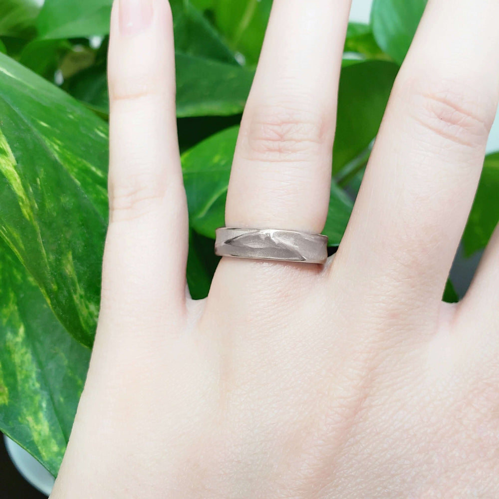 14kt white gold topography wedding ring worn on hand