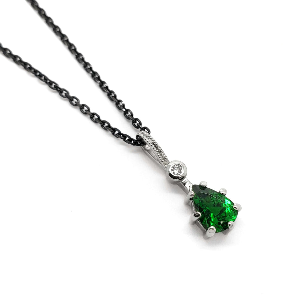 14kt white gold pendant with pear-cut green tsavorite garnet and lab diamond on black chain