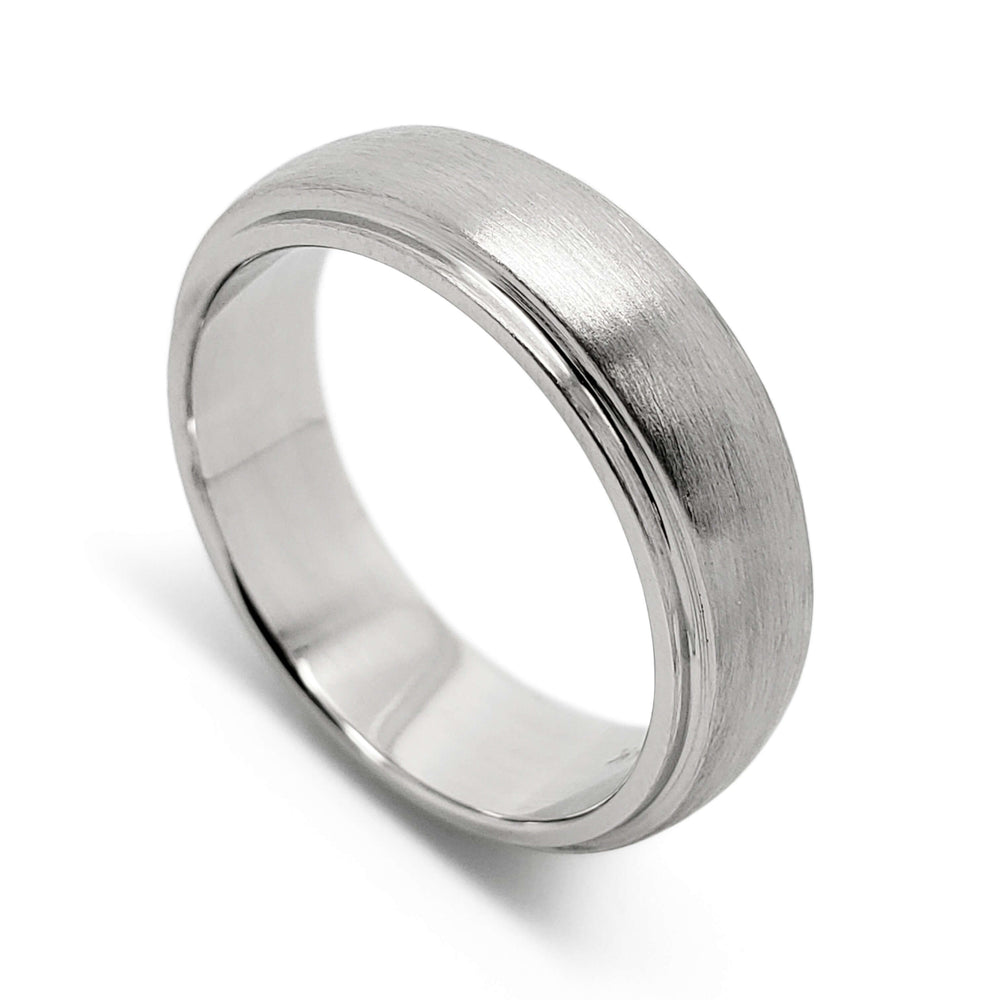 14kt white gold wedding ring with brushed finish and domed step profile