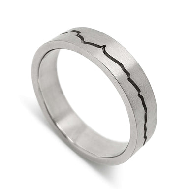 14kt white gold wedding ring with engraved mountain range design and brushed finish