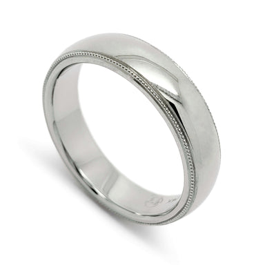14kt white gold wedding ring with high polish and millgrain edge detail
