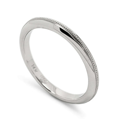 14kt white gold wedding ring with knife edge profile and millgrain detail