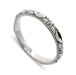 14kt white gold wedding ring with raised leaf and flower details, millgrain edge