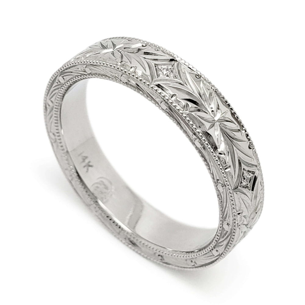 14kt white gold wedding ring with vintage-inspired hand engraving and Canadian diamonds