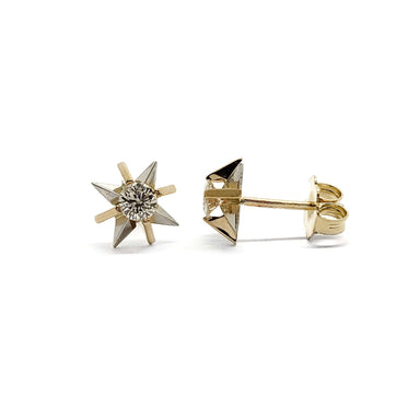 Pair of vintage starburst stud earrings in 14kt yellow and white gold with round diamonds