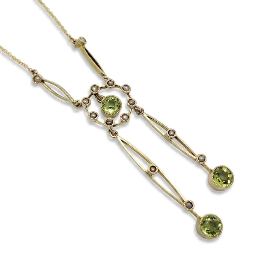 Edwardian style negligee necklace with peridot and seed pearls in 14kt yellow gold