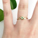 14kt yellow gold Montana sapphire ring with leaf details, shown on hand
