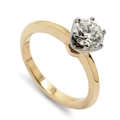 14kt yellow gold and white gold solitaire ring with round diamond in six-prong setting