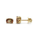 Pair of oval cut andalusite stud earrings in 14kt yellow gold on white background