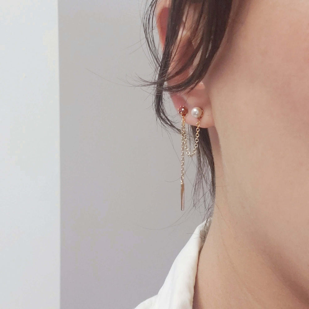 14kt yellow gold chain stud earring jacket worn with pearl and garnet studs