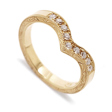 14kt yellow gold chevron wedding ring with pave set diamonds and engraved millgrain edges