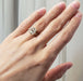 14kt yellow gold cushion lab diamond engagement ring shown on hand