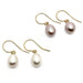 Two pairs of 14kt yellow gold dangle earrings with mauve and white oblong freshwater pearls