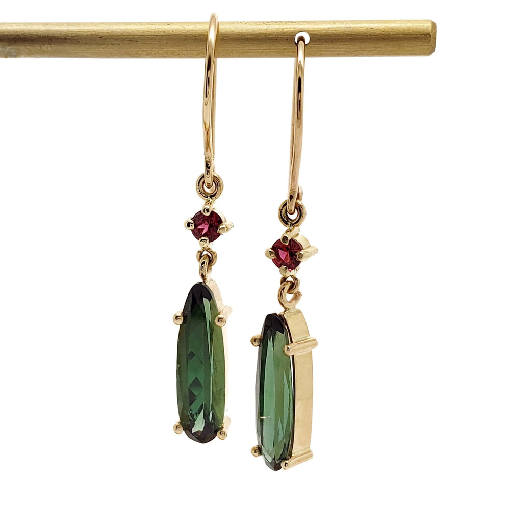 Pair of 14kt yellow gold drop earrings with elongated green tourmaline and round red spinel