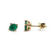 Pair of oval emerald stud earrings in 14kt yellow gold with heart prongs and diamond cut-out details
