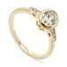 14kt yellow gold engagement ring with bezel-set oval lab diamond and pave shoulders